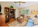 Cozy bedroom with hardwood floors, a ceiling fan, and ample natural light at 1103 Lee Ne Cir, Atlanta, GA 30324