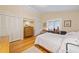 Comfortable bedroom with hardwood floors, built-in storage, and lots of natural light at 1103 Lee Ne Cir, Atlanta, GA 30324