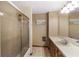 Bathroom featuring a shower with glass doors and wood vanity at 3711 Frey Lake Nw Rd, Kennesaw, GA 30144