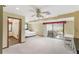 Spacious bedroom with carpet, ceiling fan, and sliding glass doors to the outdoors at 3711 Frey Lake Nw Rd, Kennesaw, GA 30144