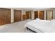 Large bedroom with carpet, closets, and natural light at 3711 Frey Lake Nw Rd, Kennesaw, GA 30144
