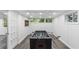 Basement game room with foosball table, recessed lighting, and wood flooring at 3711 Frey Lake Nw Rd, Kennesaw, GA 30144