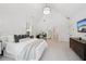 Spacious bedroom features white walls, vaulted ceilings and a cozy sitting area at 477 Michael Dr, Alpharetta, GA 30009