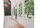 Welcoming entryway with a statement door, hardwood floors, and natural light at 477 Michael Dr, Alpharetta, GA 30009