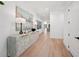 Inviting hallway featuring stylish decor and natural light pouring in from the windows at 477 Michael Dr, Alpharetta, GA 30009