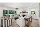 Cozy living room features a brick fireplace and sliding glass doors to a patio at 477 Michael Dr, Alpharetta, GA 30009