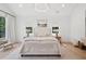 Inviting bedroom boasts ample natural light, neutral tones, and comfortable seating near backyard access at 477 Michael Dr, Alpharetta, GA 30009