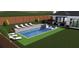 Backyard swimming pool with in-pool chairs and tanning ledge, surrounded by lounge seating and manicured landscaping at 477 Michael Dr, Alpharetta, GA 30009