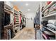 Spacious walk-in closet with custom shelving and ample storage space at 477 Michael Dr, Alpharetta, GA 30009