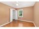 Comfortable bedroom with wood floors, closet, and ample natural light at 60 Ivy Dr, Covington, GA 30016