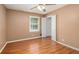 Cozy bedroom with wood floors and a closet at 60 Ivy Dr, Covington, GA 30016