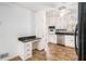 Functional kitchen with built-in workspace and stainless steel appliances at 60 Ivy Dr, Covington, GA 30016