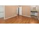 Bedroom with hardwood floors and ensuite vanity at 60 Ivy Dr, Covington, GA 30016