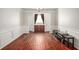 Dining room featuring elegant trim work, hardwood floors, and a modern chandelier at 915 Pebble Creek Trl, Suwanee, GA 30024
