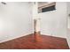 Open concept living room with wood floors and lots of natural light at 915 Pebble Creek Trl, Suwanee, GA 30024