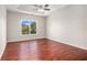 Main bedroom with hardwood floors, trey ceilings and neutral walls at 915 Pebble Creek Trl, Suwanee, GA 30024