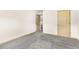 Carpeted bedroom featuring two doors and neutral paint at 1492 Station Ridge Ct, Lawrenceville, GA 30045