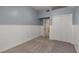 Bedroom featuring wainscoting, and double door closet for ample storage at 2102 Berryhill Se Cir, Smyrna, GA 30082