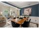 Open-concept dining area adjacent to the living room with stylish decor and plenty of space at 2102 Berryhill Se Cir, Smyrna, GA 30082