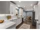 Modern kitchen featuring white cabinets, granite countertops, and stainless steel appliances at 2102 Berryhill Se Cir, Smyrna, GA 30082