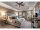 Spacious main bedroom with tray ceiling, neutral color palette, and lots of natural light at 2102 Berryhill Se Cir, Smyrna, GA 30082