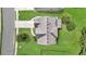 Birds-eye view of the roof of a house, nestled in a well-manicured lawn with trees and landscaping at 2619 Dayview Ln, Atlanta, GA 30331