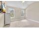 Bedroom featuring two large windows, neutral carpeting, and a white dresser at 2619 Dayview Ln, Atlanta, GA 30331