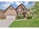 Charming two-story home with a well-manicured lawn and a two-car garage, enhancing curb appeal at 2619 Dayview Ln, Atlanta, GA 30331