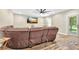 Media room featuring hardwood floors, a large sectional sofa, and a ceiling fan at 2619 Dayview Ln, Atlanta, GA 30331