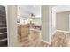 Open concept living area with dining space and bar, visible from hallway at 2619 Dayview Ln, Atlanta, GA 30331