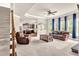 Spacious living room with a ceiling fan, neutral colored walls, and lots of light at 2619 Dayview Ln, Atlanta, GA 30331