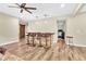 Living area with bar, hardwood floors, and four barstools at 2619 Dayview Ln, Atlanta, GA 30331