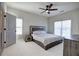 Comfortable bedroom with plush carpeting, natural light, and modern furnishings at 841 Keystone Dr, Woodstock, GA 30188