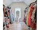Spacious walk-in closet featuring light wood floors and ample storage at 841 Keystone Dr, Woodstock, GA 30188