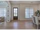 Inviting dining room with hardwood floors, modern lighting, and elegant decor at 841 Keystone Dr, Woodstock, GA 30188