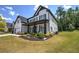 Beautiful two-story home with a well-manicured lawn and welcoming front porch at 841 Keystone Dr, Woodstock, GA 30188