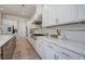 Bright kitchen with stainless steel appliances, lots of cabinet space, light countertops, and a stylish backsplash at 841 Keystone Dr, Woodstock, GA 30188