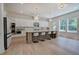 Bright kitchen with island seating, marble countertops, and stainless steel appliances at 841 Keystone Dr, Woodstock, GA 30188