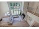 Spacious living room with stone fireplace, large windows, and hardwood floors at 841 Keystone Dr, Woodstock, GA 30188