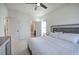 Comfortable main bedroom with plush carpeting, natural light, and en suite bath at 841 Keystone Dr, Woodstock, GA 30188