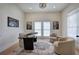 Home office featuring a dark desk, modern decor, and lots of natural light at 841 Keystone Dr, Woodstock, GA 30188