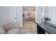 View from home office through french doors into dining room; stylish decor at 841 Keystone Dr, Woodstock, GA 30188
