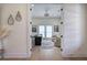 View into bright office with two chairs, desk, neutral colors, and lots of light at 841 Keystone Dr, Woodstock, GA 30188