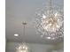 Elegant pendant lights hang from the ceiling at 841 Keystone Dr, Woodstock, GA 30188