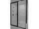 Modern glass shower featuring marble tile and black hardware at 841 Keystone Dr, Woodstock, GA 30188