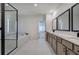 Bathroom featuring double sinks, stone countertops, modern black fixtures, shower, and tub at 841 Keystone Dr, Woodstock, GA 30188