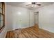 Bedroom with hardwood floors, a window and two closets at 303 Nottingham Dr, Woodstock, GA 30188