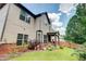 Backyard with a well-maintained lawn and a covered patio at 312 Sierra Ct, Mcdonough, GA 30253