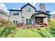 Backyard with a well-manicured lawn and a covered patio at 312 Sierra Ct, Mcdonough, GA 30253
