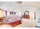 Spacious bedroom with vaulted ceilings, carpet floors, and a decorative dresser at 312 Sierra Ct, Mcdonough, GA 30253
